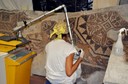 Un momento del restauro del mosaico di Savignano