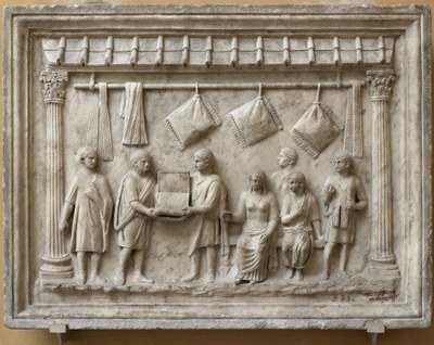 05_Rilievo romano in marmo con scena di vendita di cuscini dagli Uffizi.jpg