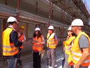 L'assessora all'Ambiente Alessandra Filippi insieme a tecnici del Comune, di Hera e del cantiere in corso alle scuole Galilei-Calvino