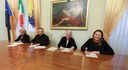 Da sx: Giacomini, Vescovo Castellucci, ass. Pinelli e ass. Baracchi per la firma di Accordo e Protocollo
